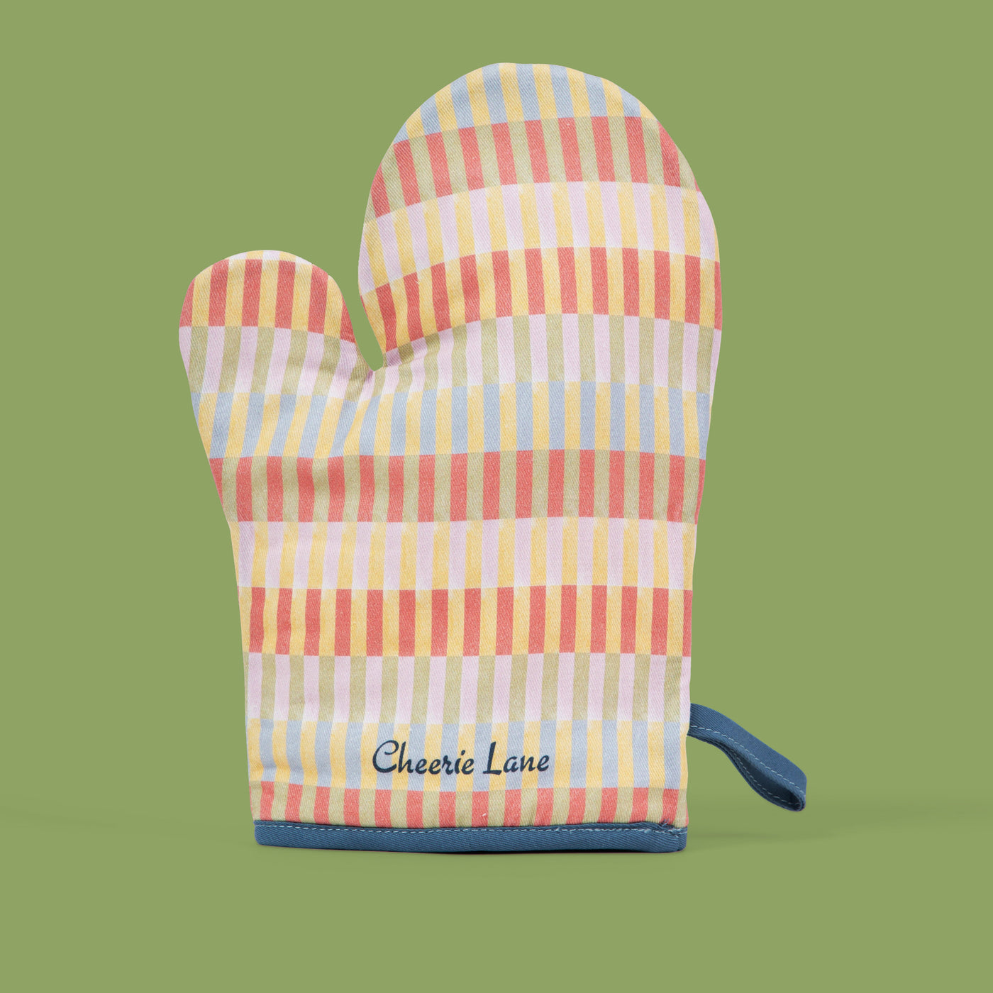 Colorful striped oven mitt and pot holder with 'Cheerie Lane' branding on a green background